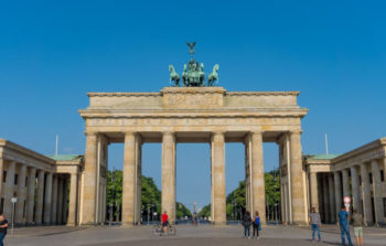 large memorial gate with statue on top