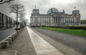 large stone parliament building from behind