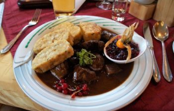 meaty stew with thick slices of toast