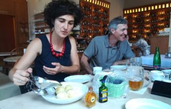 woman and man eating in restaurant