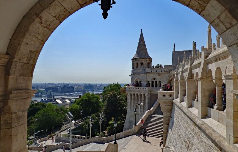 stone palace viewed through arch