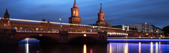 The Oberbaumbruecke lit up, at night.