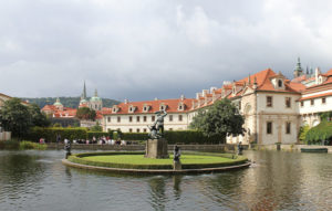 large fountain in the middle of pond