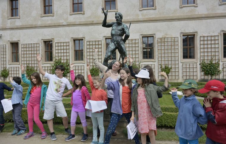 a group of kids on a walking tour in Prague