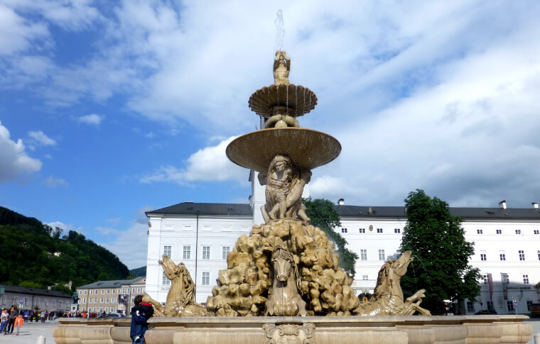 grand stone fountain with 3 tiers