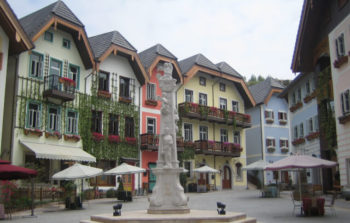 medieval square with coloured houses and angled roofs