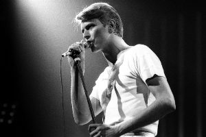 black and white photo of David Bowie on a concert
