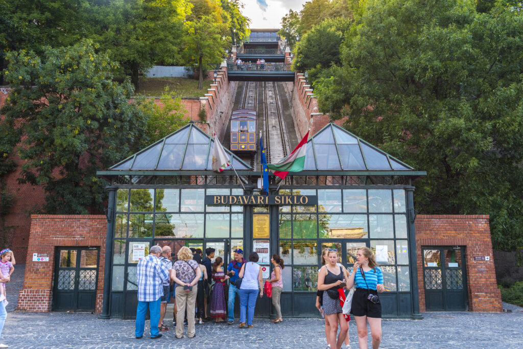 The entrance to the funicular on the lower end of Buda Hill, with people waiting to get inside